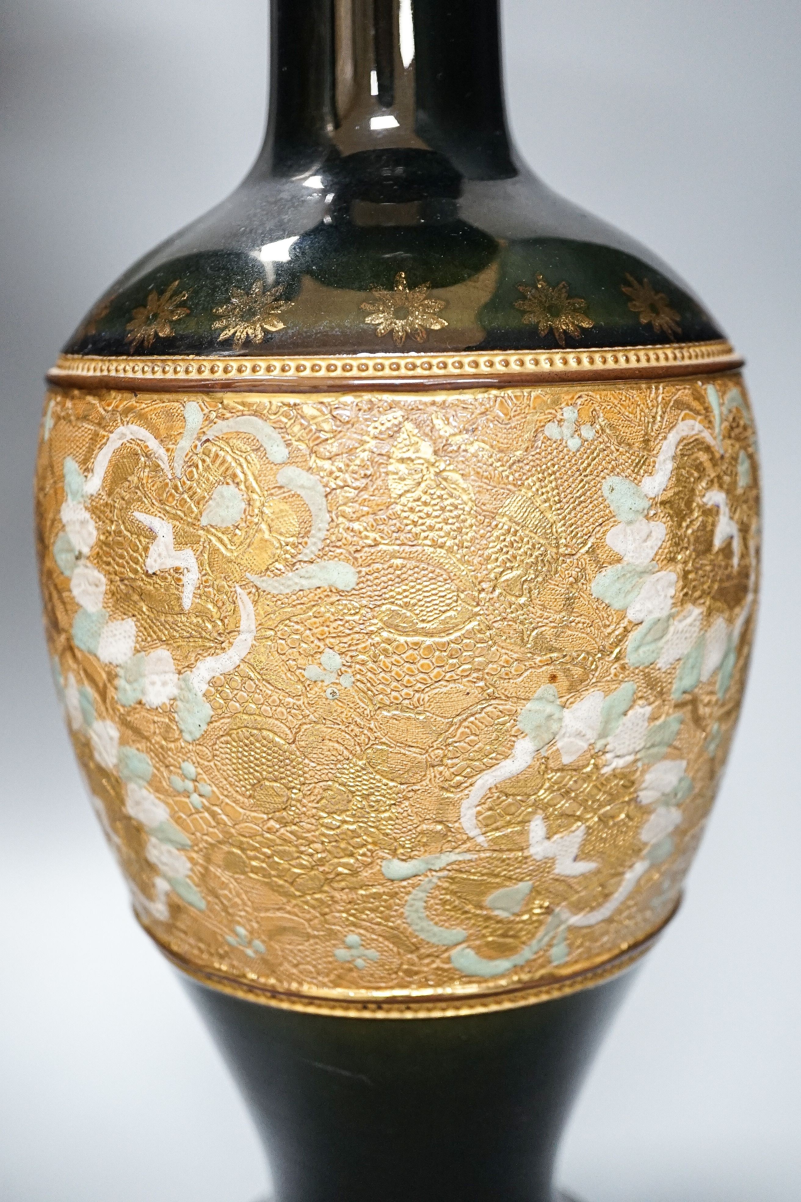A large Doulton Slater's Patent vase, 46cm and a pair of similar smaller vases, 34cm